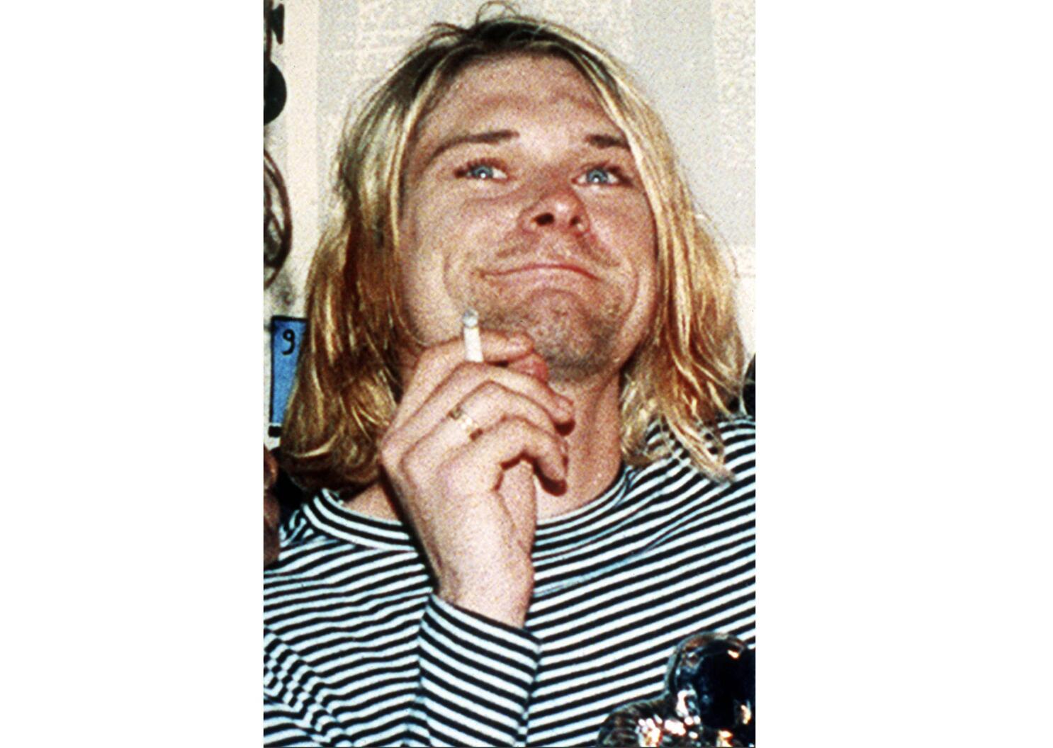 Treasure trove of rock memorabilia includes Kurt Cobain hair | AP News